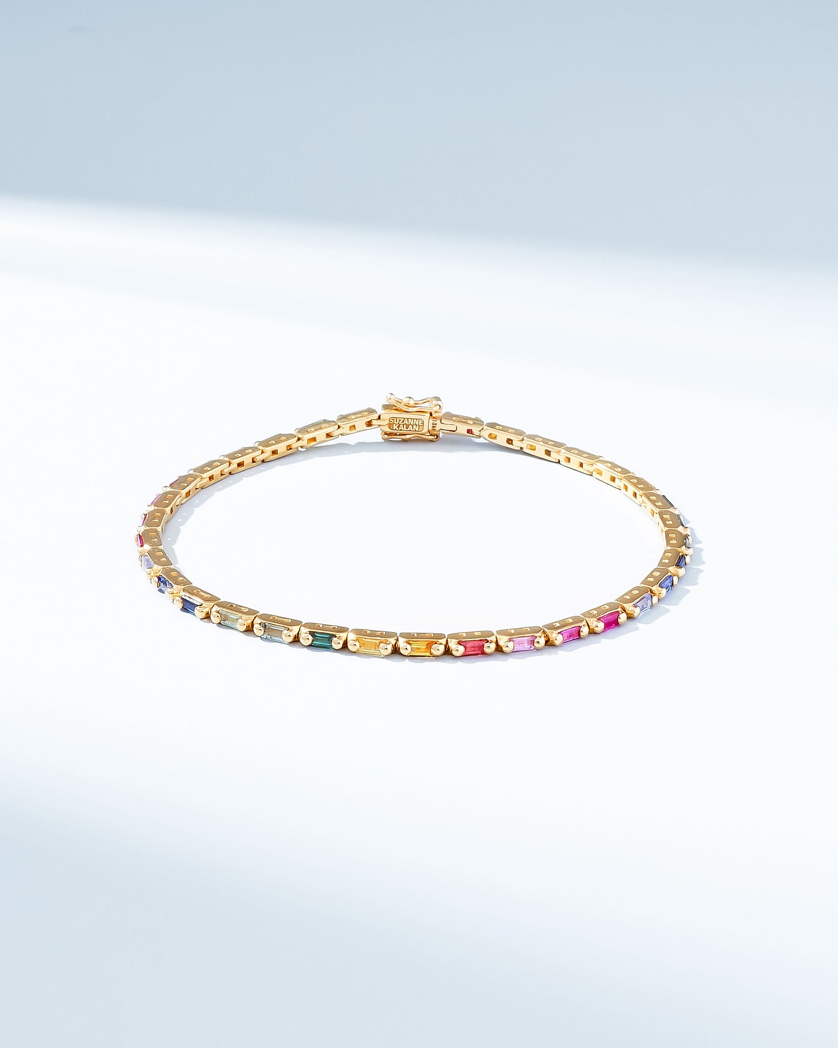 Suzanne Kalan Linear Rainbow Sapphire Tennis Bracelet in 18k yellow gold