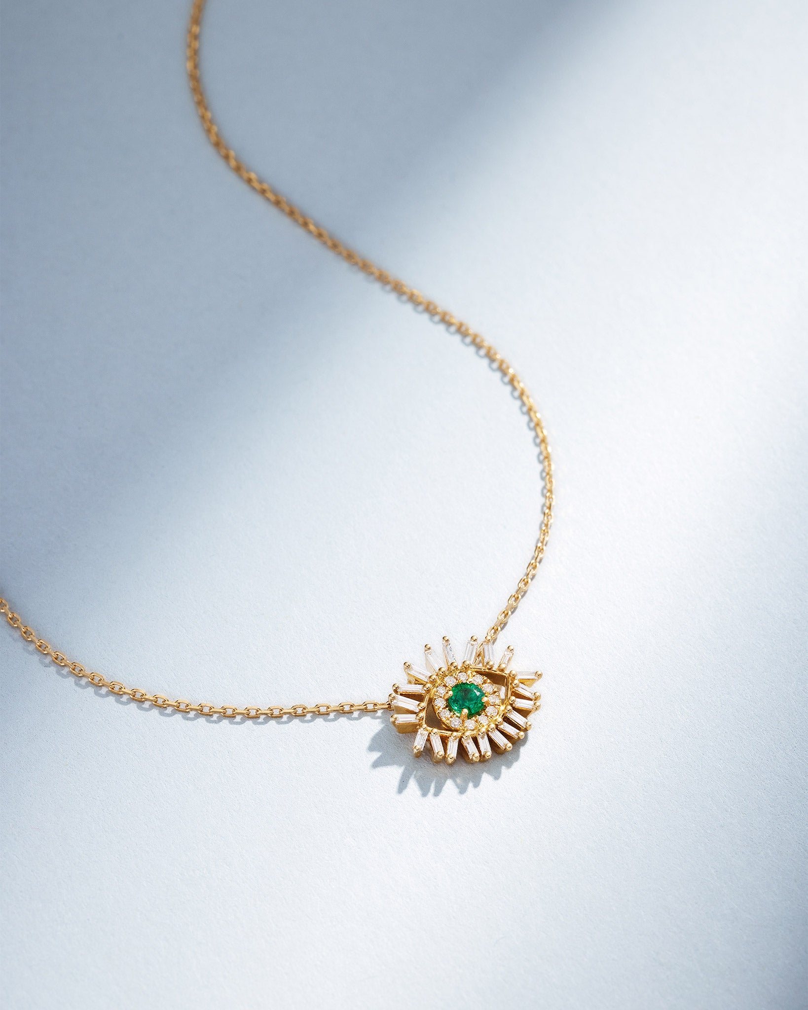 Suzanne Kalan Evil Eye Mini Emerald Pendant in 18k yellow gold