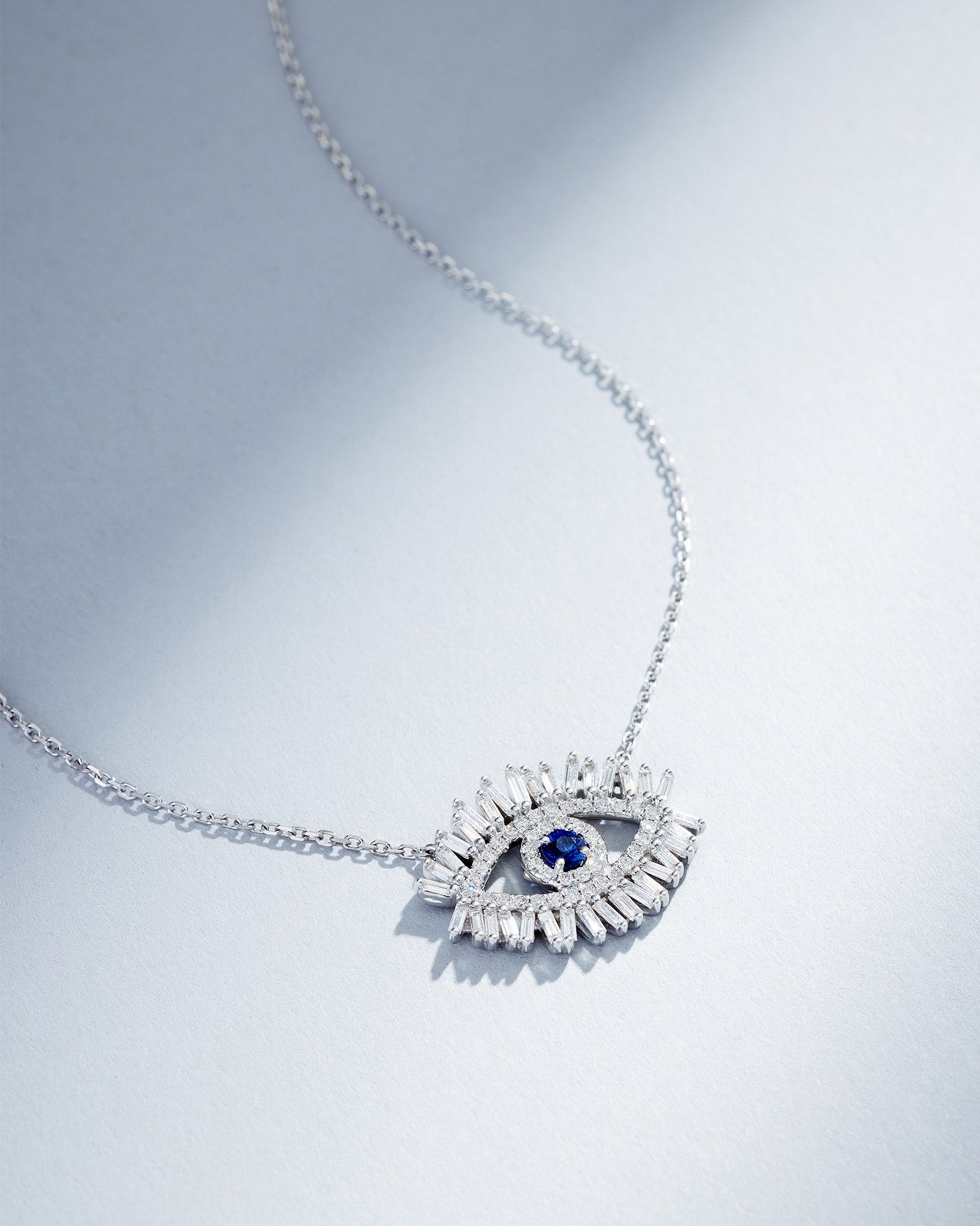 Suzanne Kalan Evil Eye Midi Dark Blue Sapphire Half Pavé Pendant in 18k white gold