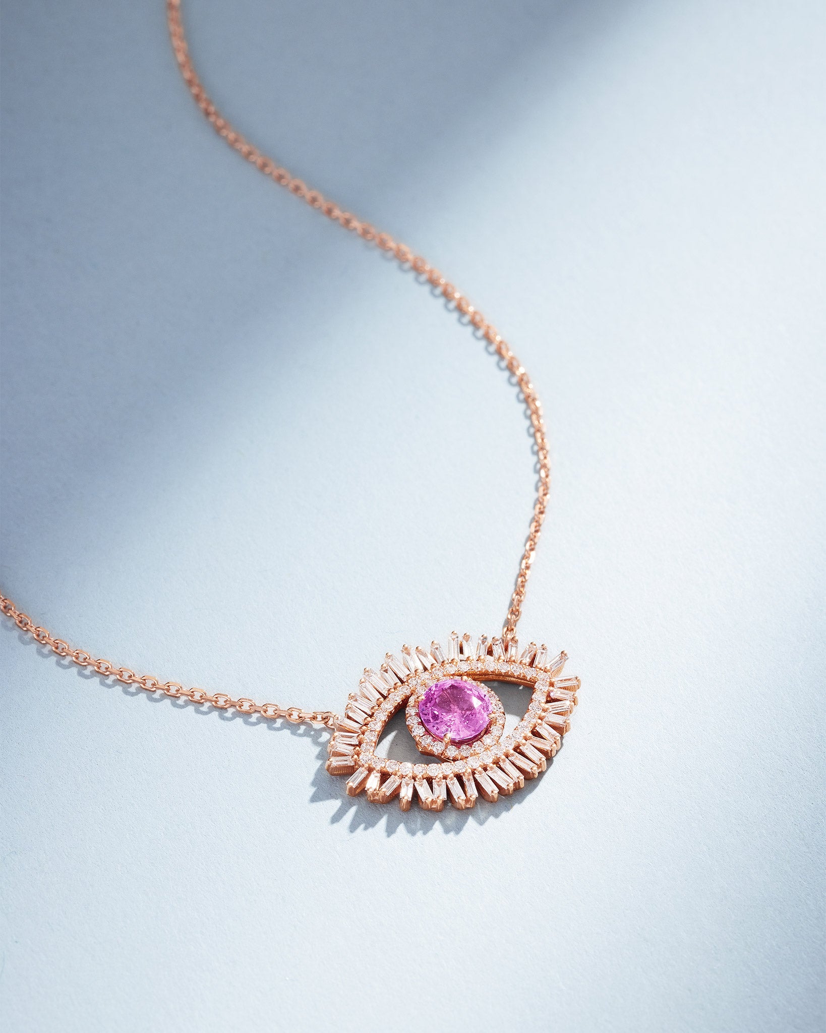 Suzanne Kalan Evil Eye Milli Pink Sapphire Half Pavé Pendant in 18k rose gold