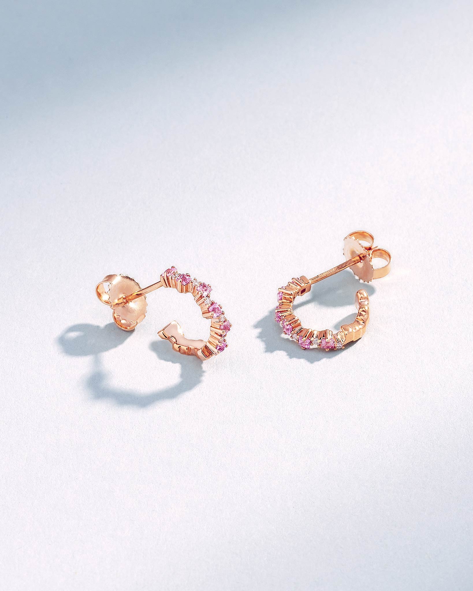 Suzanne Kalan Princess Staggered Pink Sapphire Mini Hoops in 18k rose gold