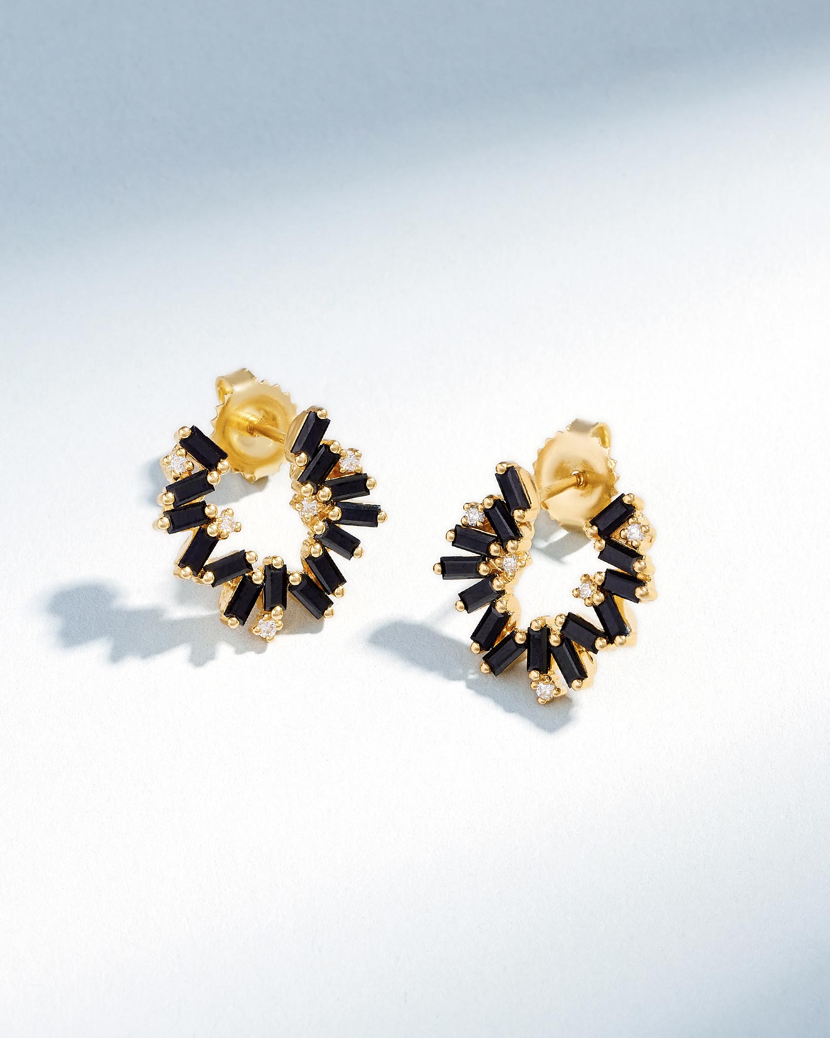 Suzanne Kalan Bold Burst Black Sapphire Sideways Mini Hoops in 18k yellow gold