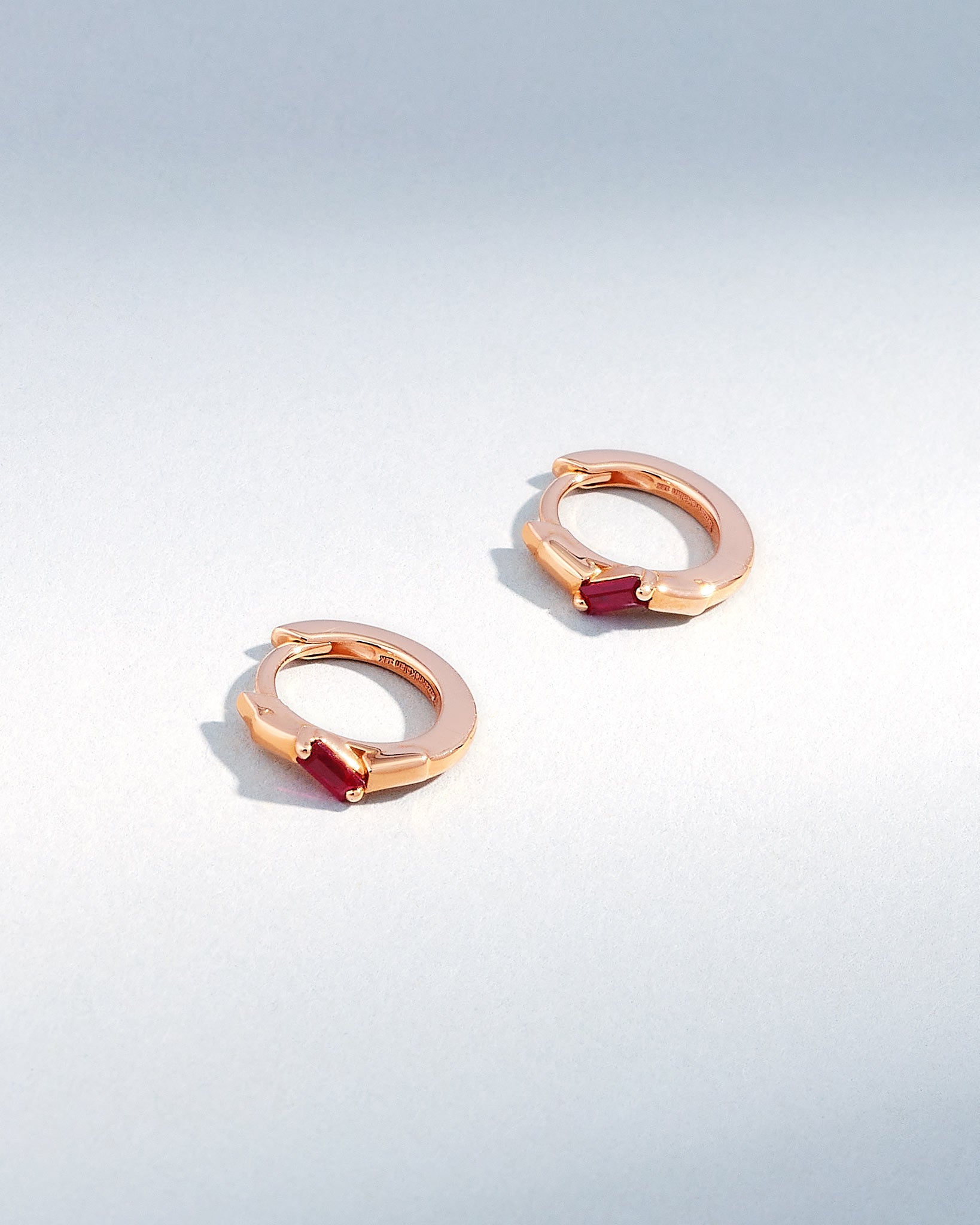 Suzanne Kalan Bold Single Ruby Huggies in 18K rose gold