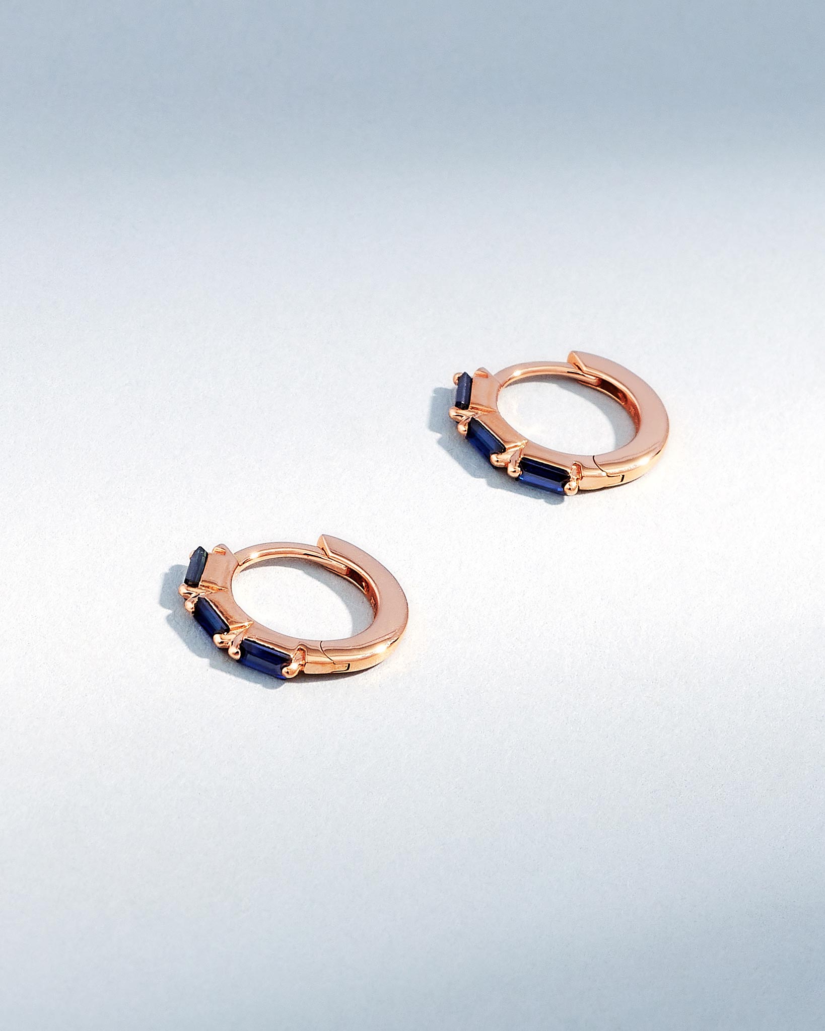 Suzanne Kalan Bold Triple Dark Blue Sapphire Huggies in 18K rose gold