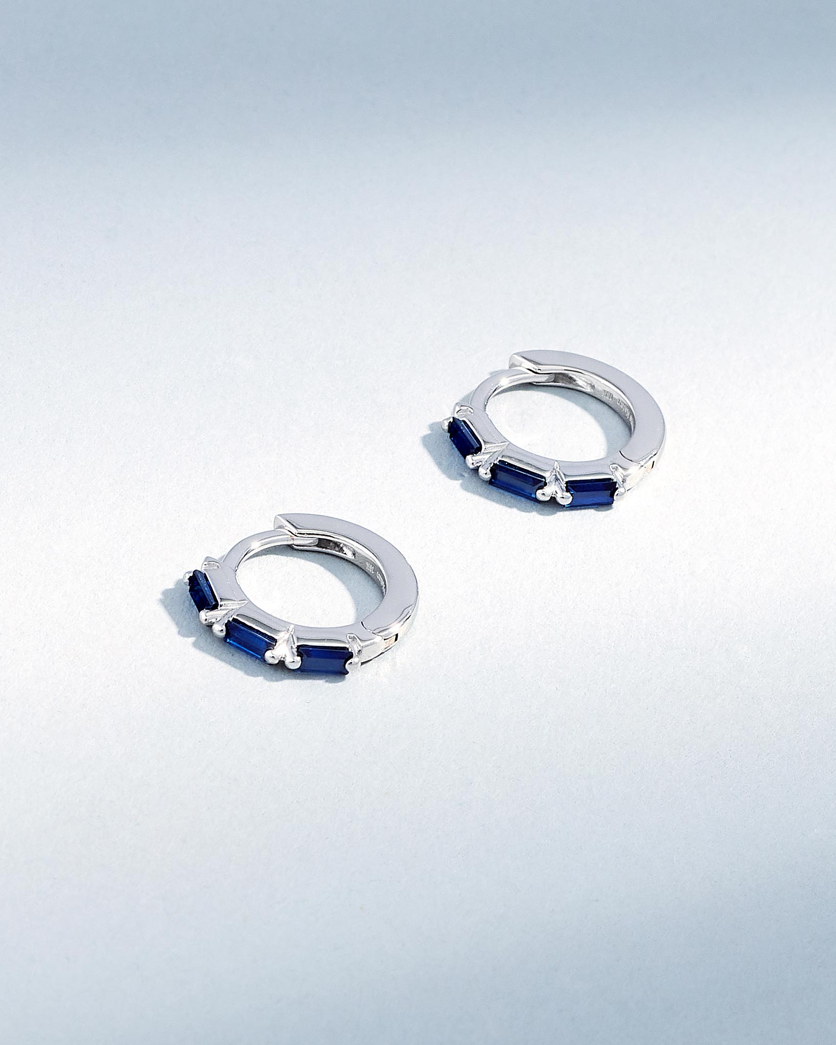 Suzanne Kalan Bold Triple Dark Blue Sapphire Huggies in 18K white gold