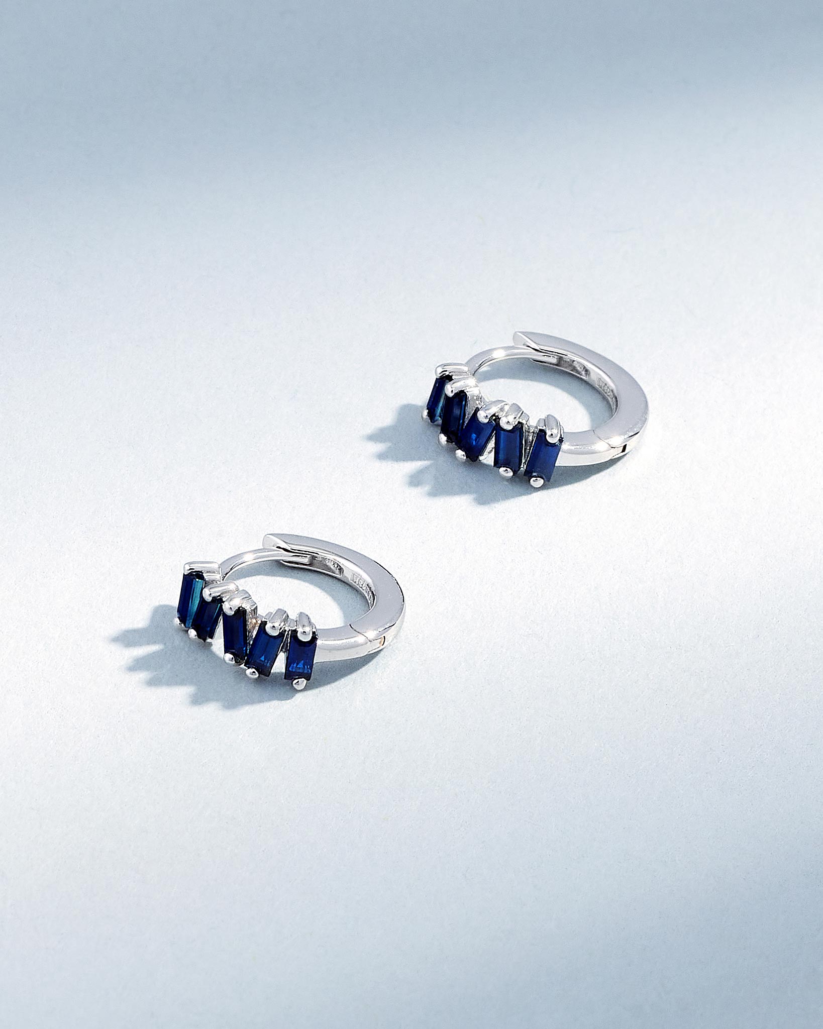 Suzanne Kalan Bold Dark Blue Sapphire Huggies in 18K white gold