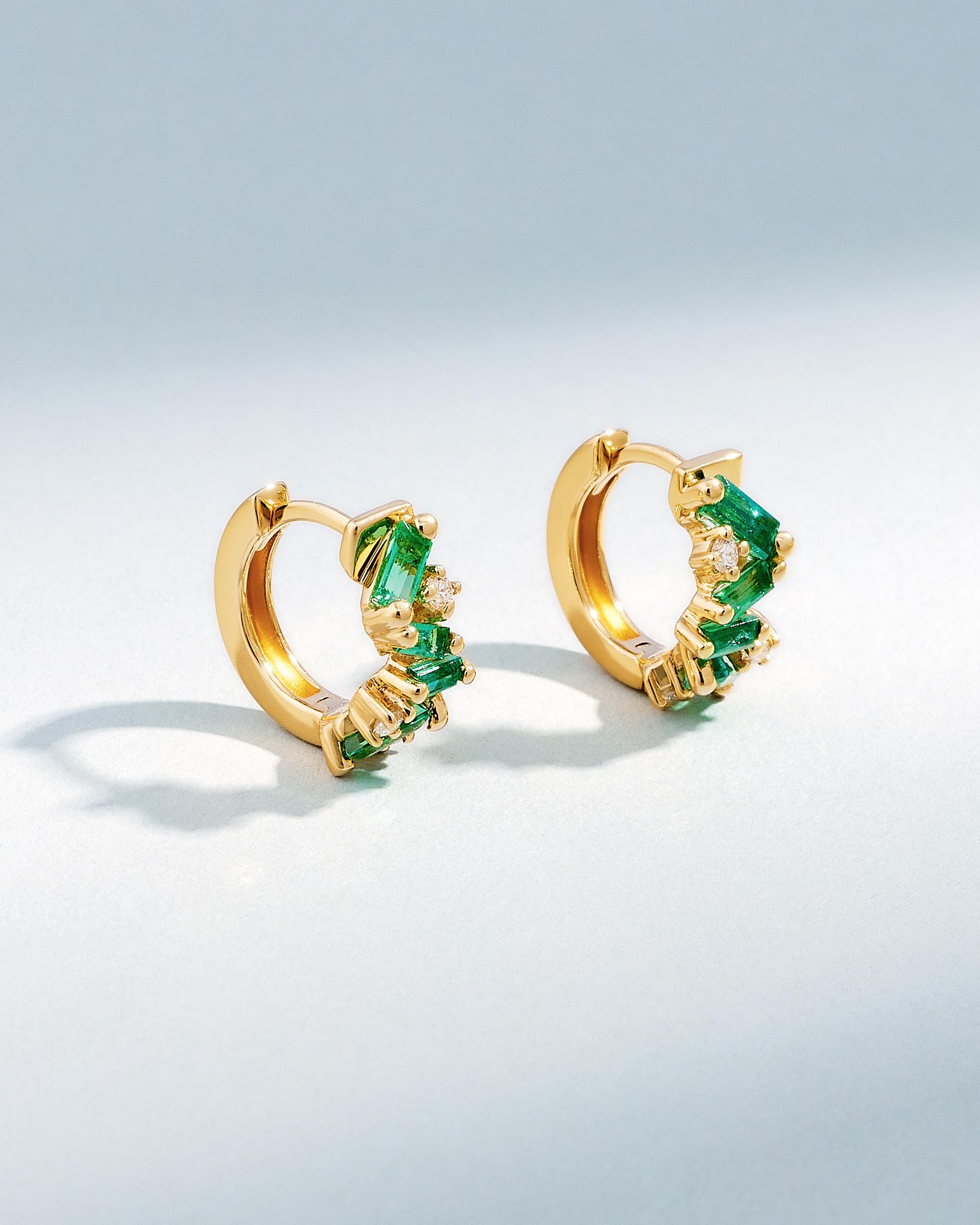 Suzanne Kalan Frenzy Emerald Huggies in 18K yellow gold