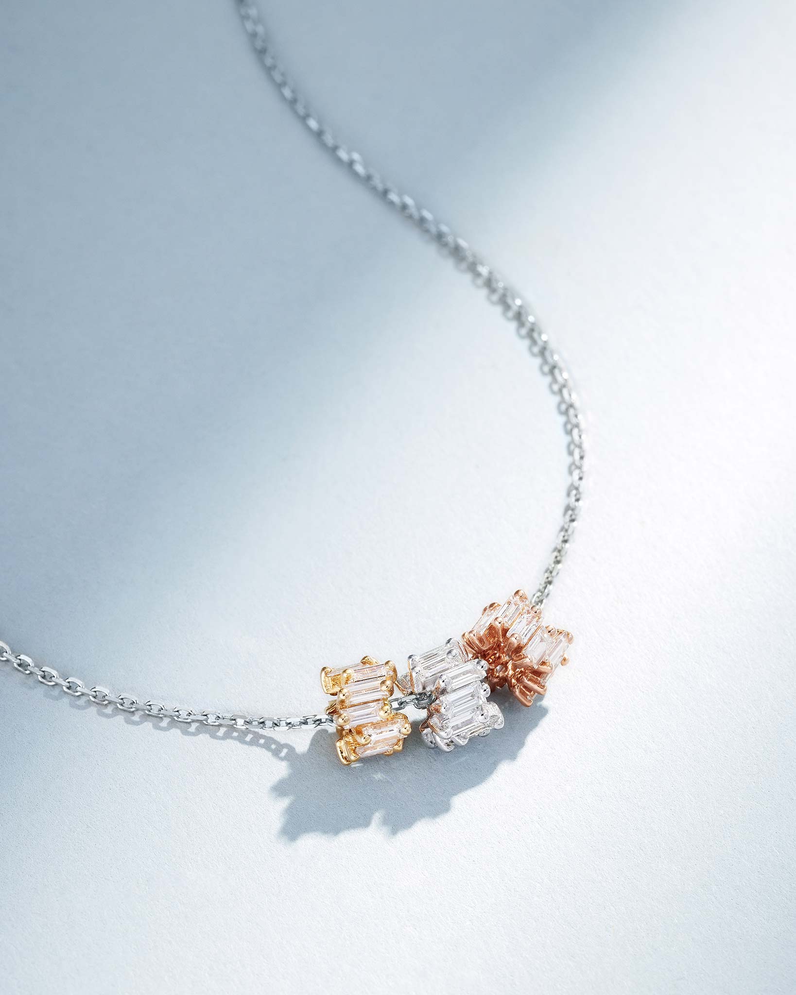 Suzanne Kalan Infinite Triple Diamond Tri-Color Rondelle Pendant with an 18k white gold chain