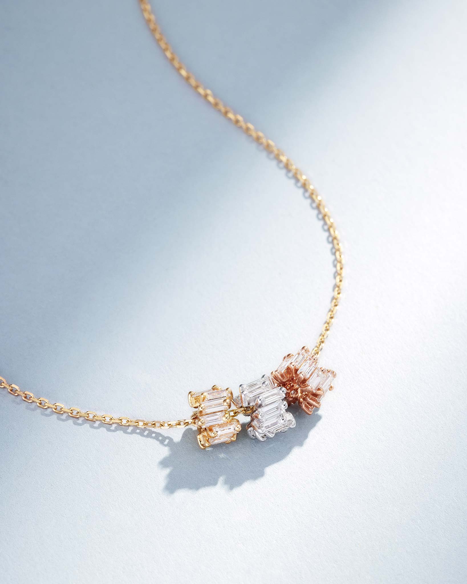 Suzanne Kalan Infinite Triple Diamond Tri-Color Rondelle Pendant with an 18k yellow gold chain