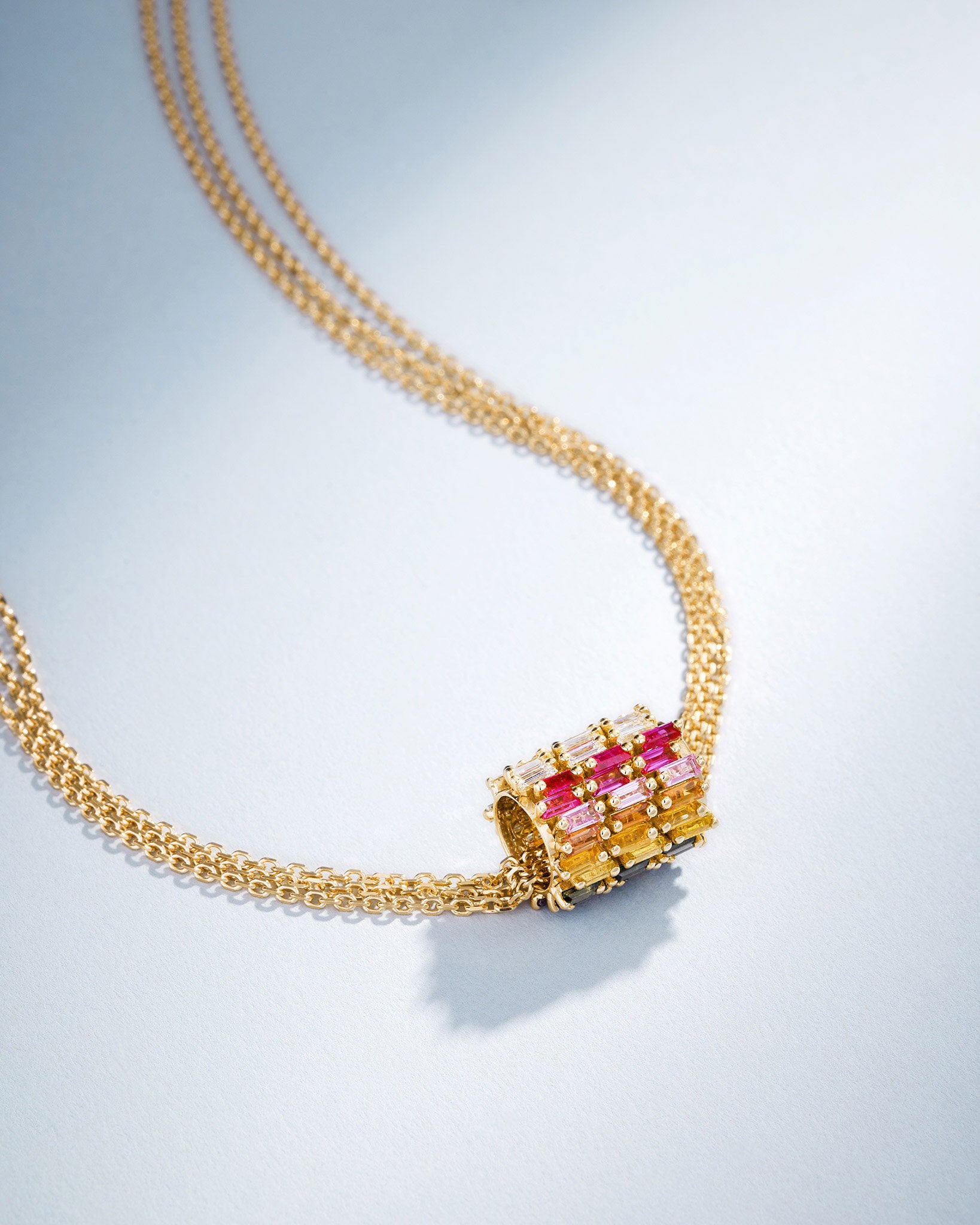 Suzanne Kalan Infinite Triple Row Rainbow Sapphire & Diamond Rondelle Pendant in 18k yellow gold