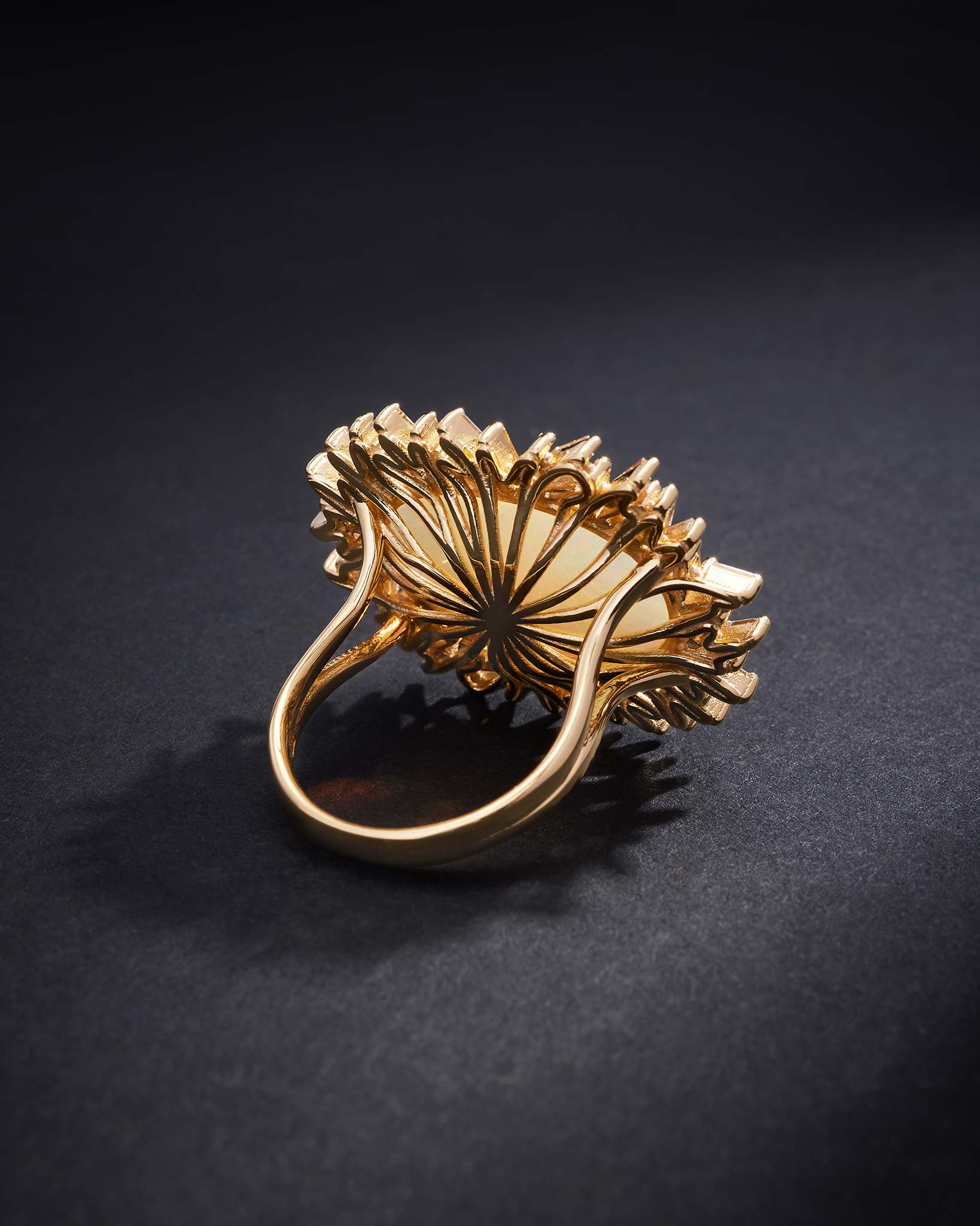 Suzanne Kalan One of a Kind Oval Shaped African Opal Sunburst Ring in 18k yellow gold