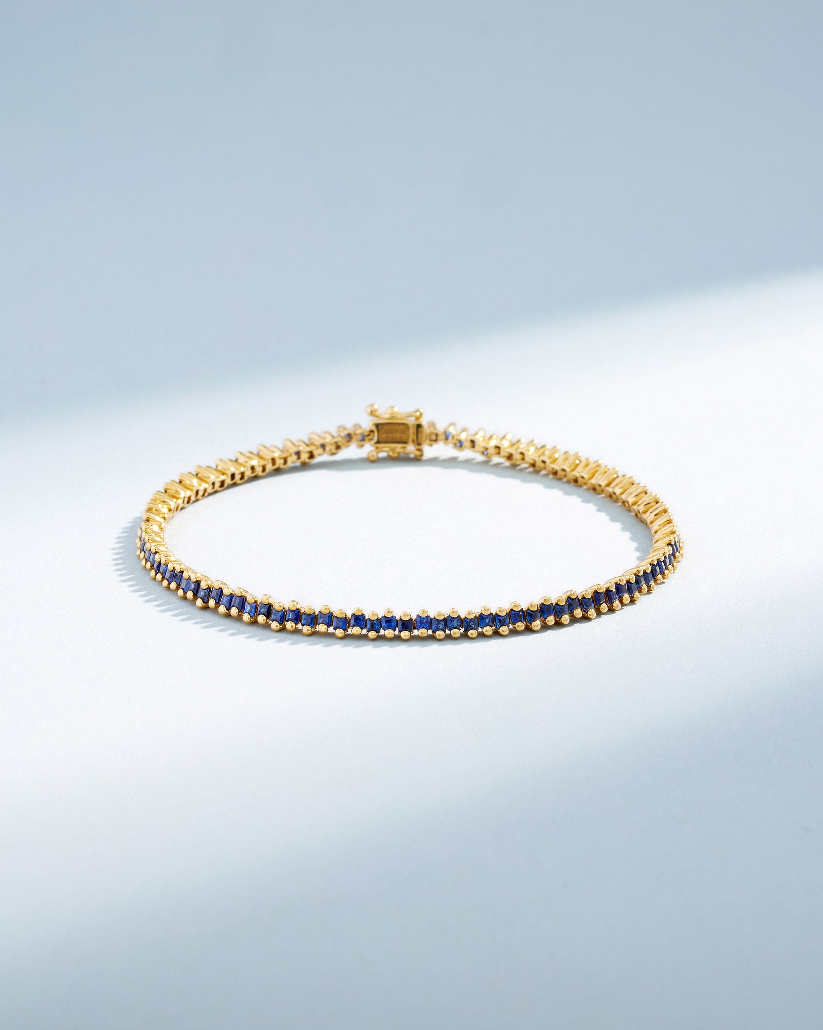 Suzanne Kalan Princess Mini Dark Blue Sapphire Tennis Bracelet in 18k yellow gold