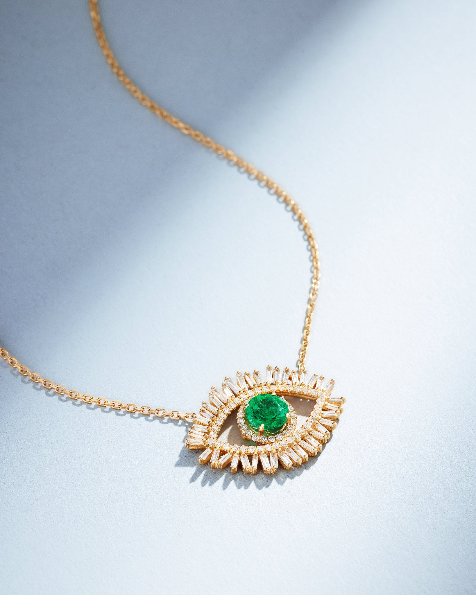 Suzanne Kalan Evil Eye Milli Emerald Half Pavé Pendant in 18k yellow gold