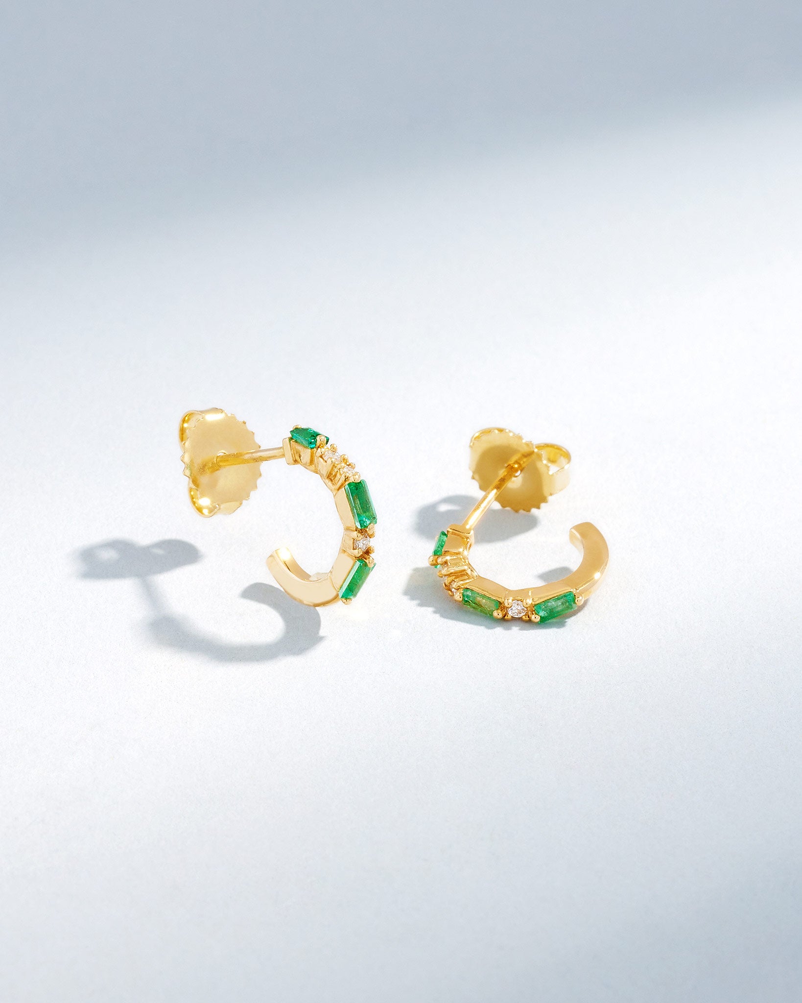 Suzanne Kalan Thin Mix Mini Emerald Hoops in 18k yellow gold