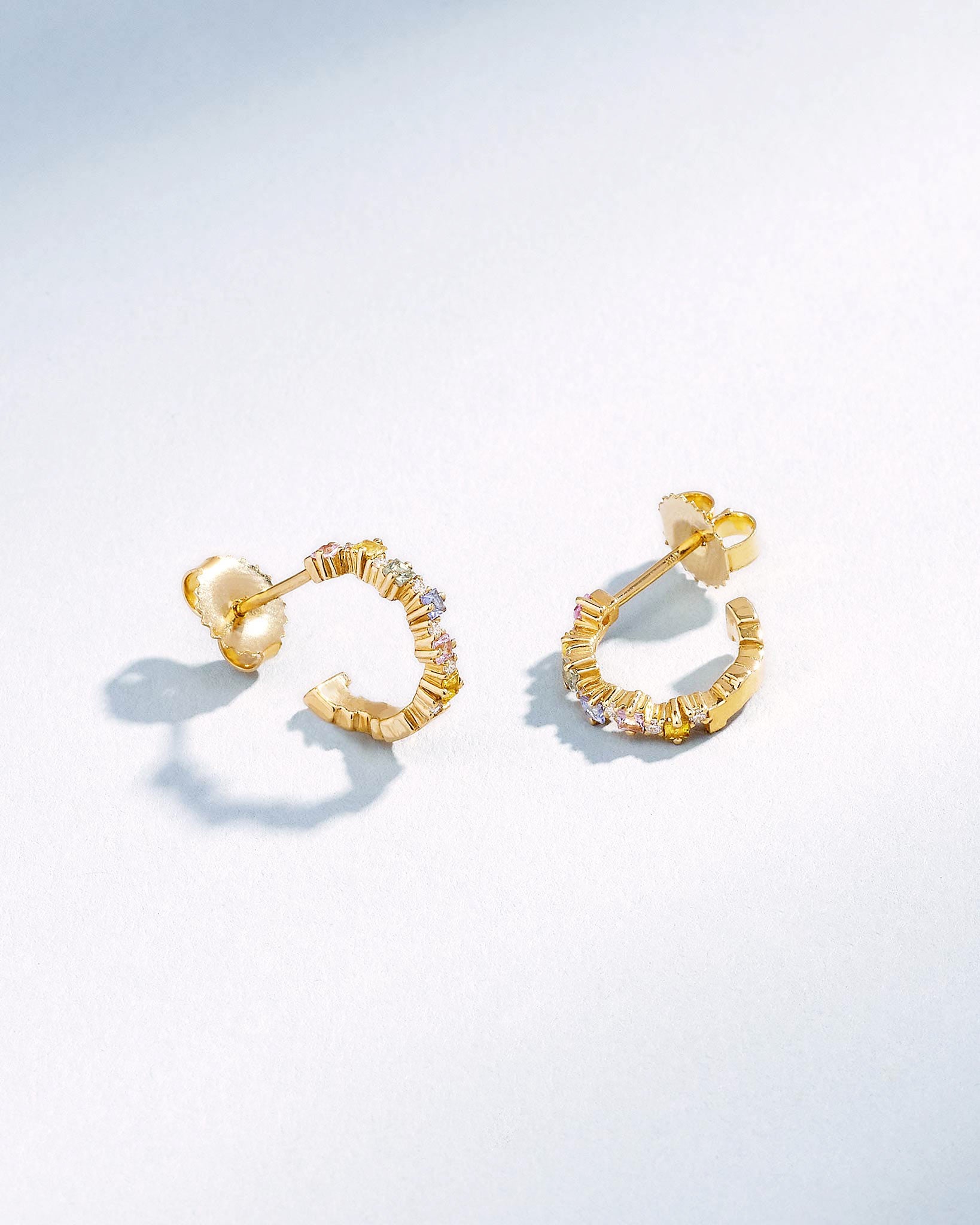 Suzanne Kalan Princess Staggered Pastel Sapphire Mini Hoops in 18k yellow gold