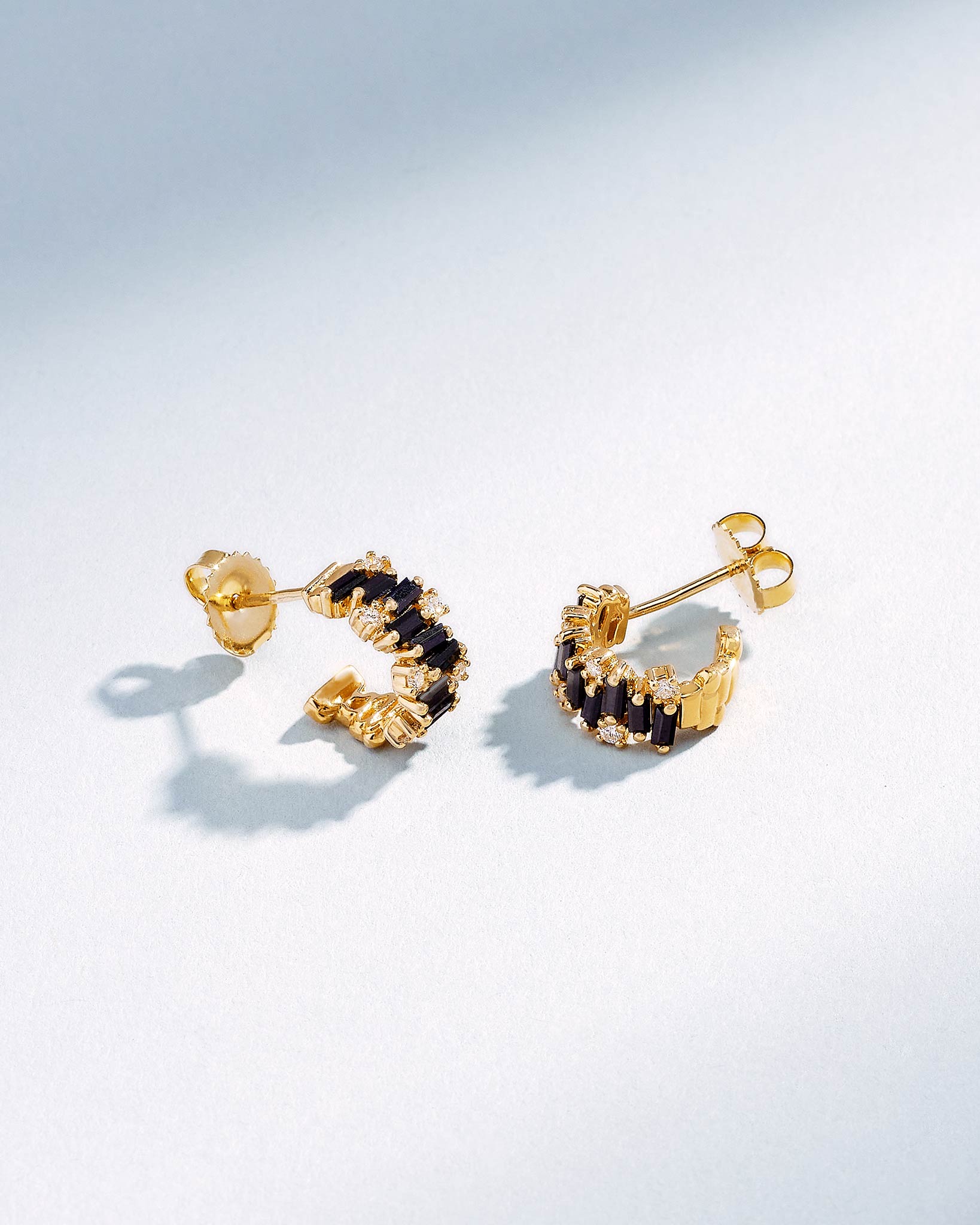 Suzanne Kalan Shimmer Black Sapphire Mini Hoops in 18k yellow gold