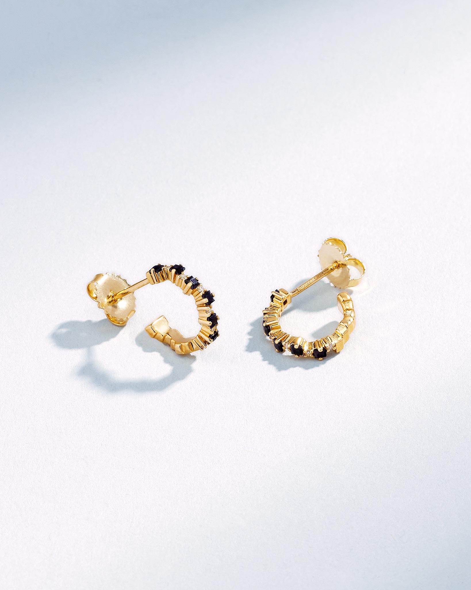 Suzanne Kalan Princess Staggered Black Sapphire Mini Hoops in 18k yellow gold