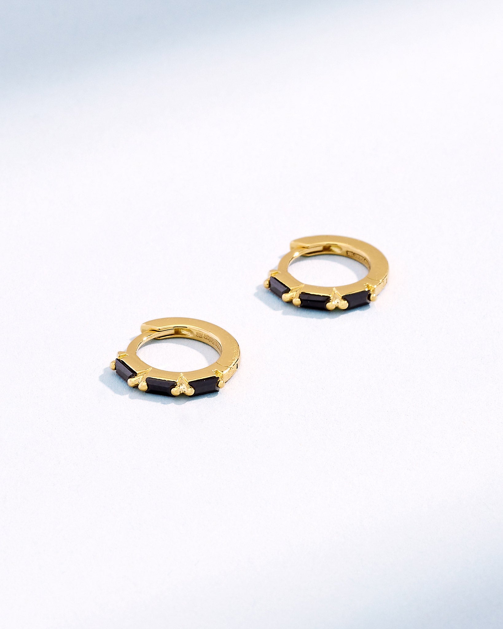 Suzanne Kalan Bold Triple Black Sapphire Huggies in 18K yellow gold