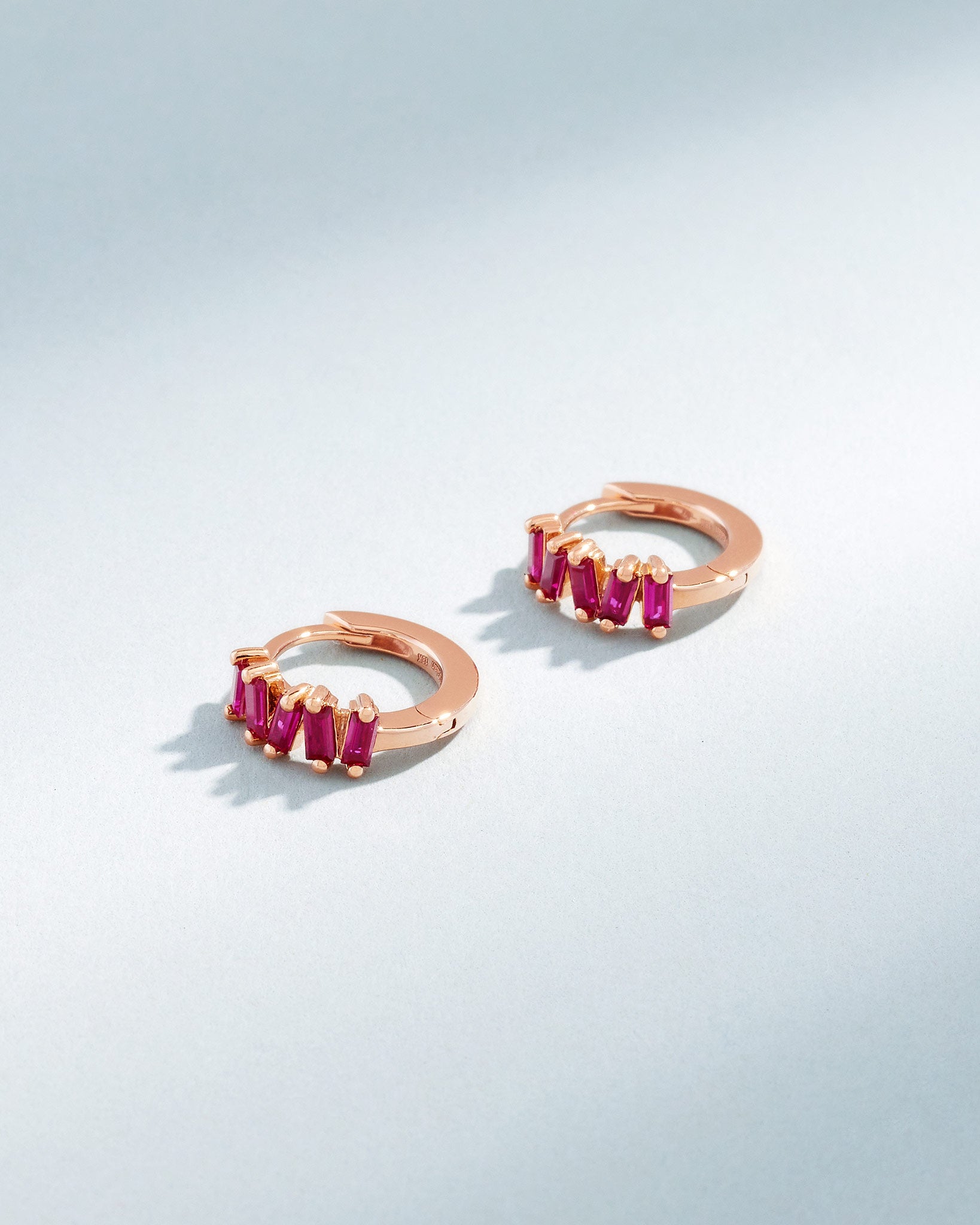 Suzanne Kalan Bold Ruby Huggies in 18K rose gold