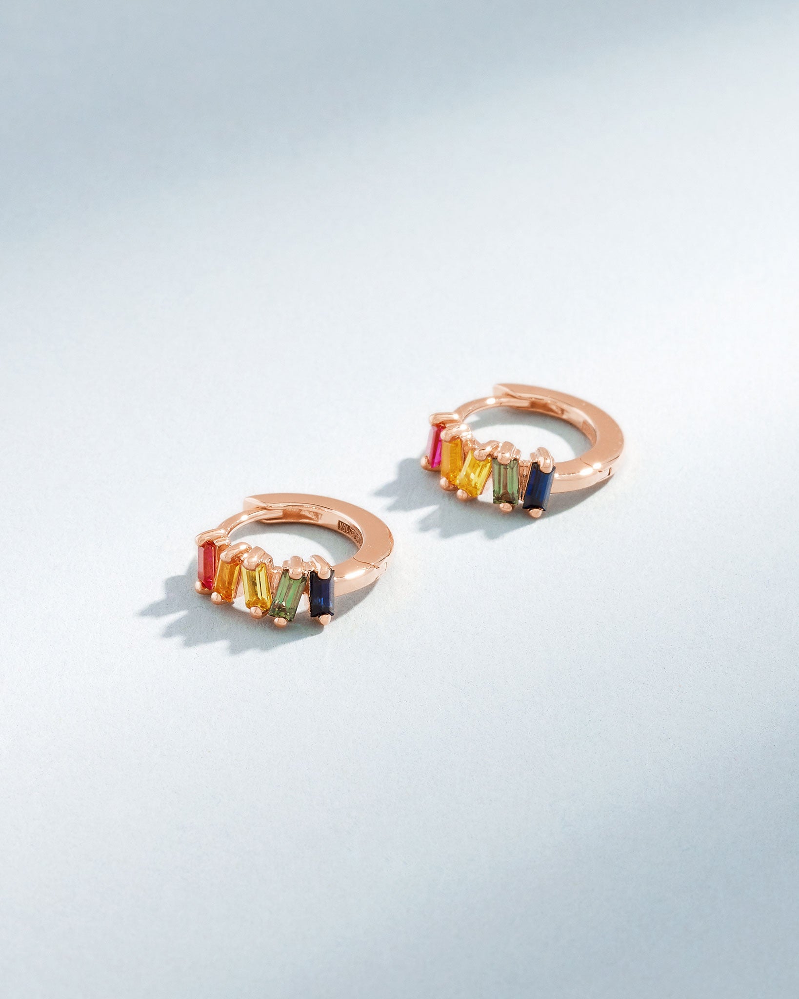 Suzanne Kalan Bold Rainbow Sapphire Huggies in 18K rose gold