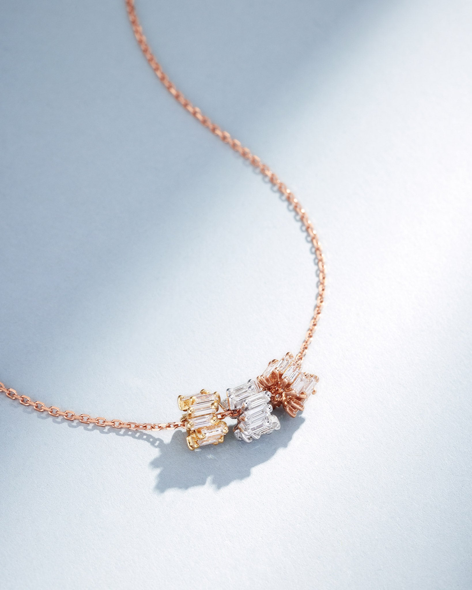Suzanne Kalan Infinite Triple Diamond Tri-Color Rondelle Pendant with an 18k rose gold chain