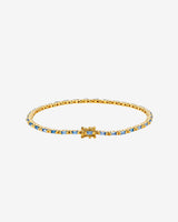 Suzanne Kalan Linear Light Blue Sapphire Tennis Bracelet in 18k yellow gold
